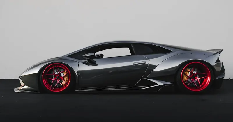 Auto dealership showroom with polished floors and cars