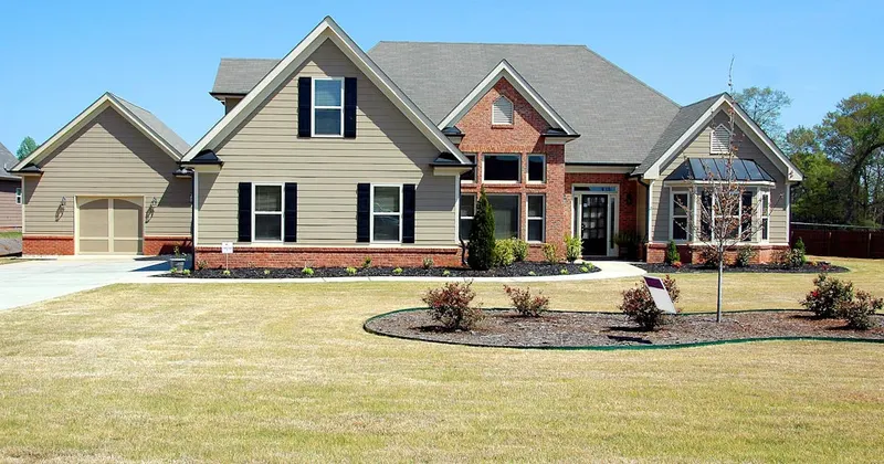 Commercial building exterior being pressure washed