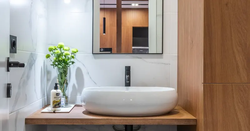 Clean bathroom with natural cleaning products on counter