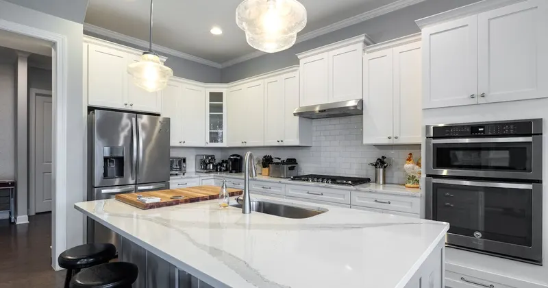 Kitchen stovetop being cleaned with eco-friendly solution