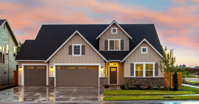 Vacant house exterior needing renovation and cleanup