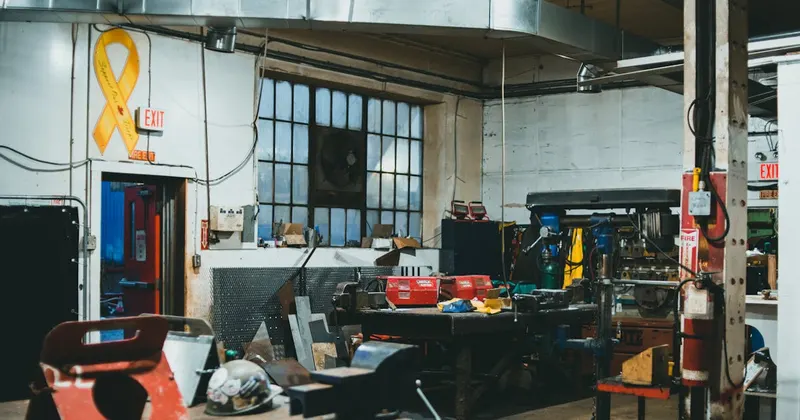 Organized garage interior with storage shelves and tools