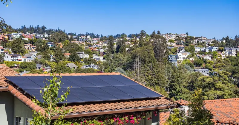 Texas home with solar panels under bright summer sunshine