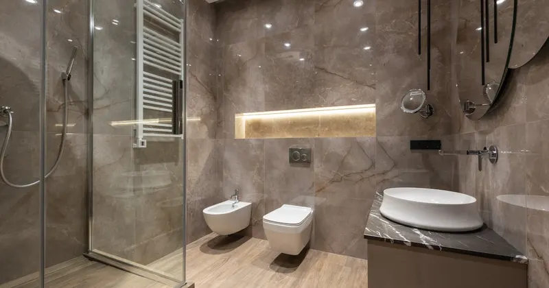 Spacious bathroom interior with tiled walls and exhaust ventilation
