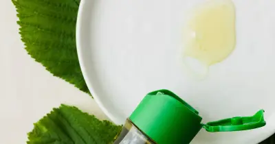 Baby oil in a glass bottle used for polishing and cleaning surfaces