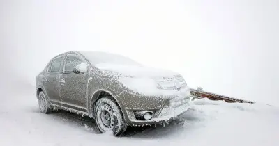 Frozen car and icy conditions during a Texas winter ice storm