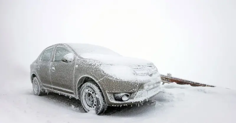Frozen car and icy conditions during a Texas winter ice storm