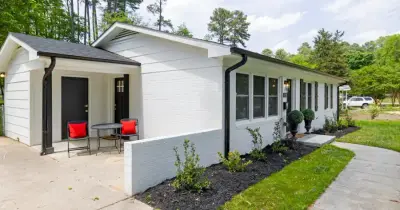Well-maintained ranch-style home in Magnolia TX with clean exterior and green lawn