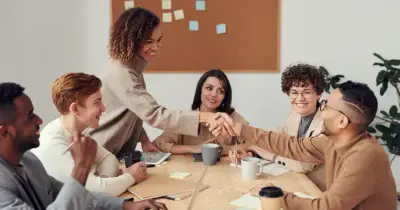 Business professionals collaborating in a clean modern office workspace