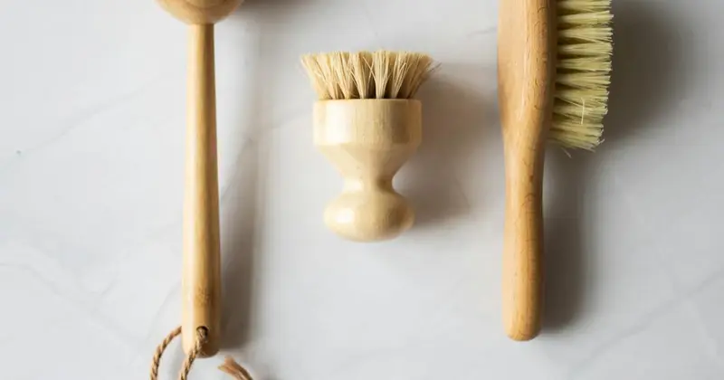 Eco-friendly cleaning products with natural ingredients on a wooden surface