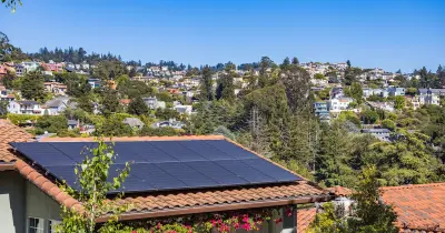 Texas home with solar panels under bright summer sunshine