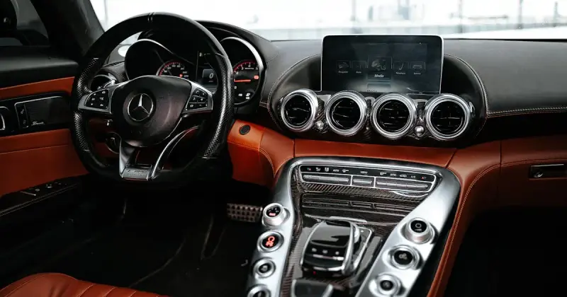 Clean and organized car interior with polished dashboard and seats