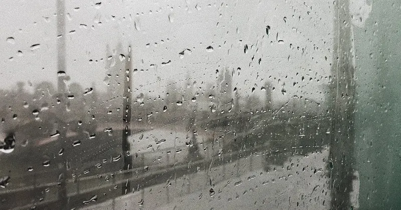 Foggy glass window showing condensation and moisture buildup