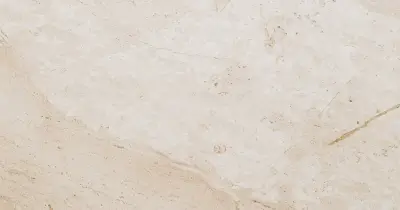 Close-up of a multicolored marble texture showcasing vibrant natural patterns and colors.