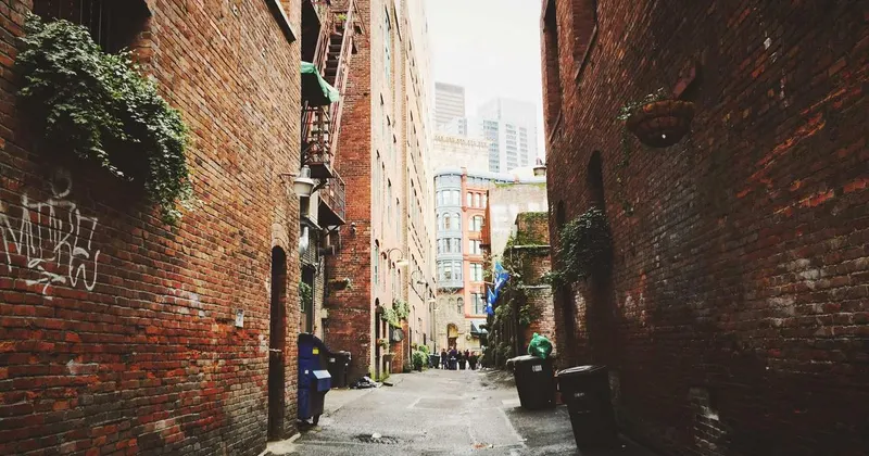 Glass bottles with leaves in a still life arrangement