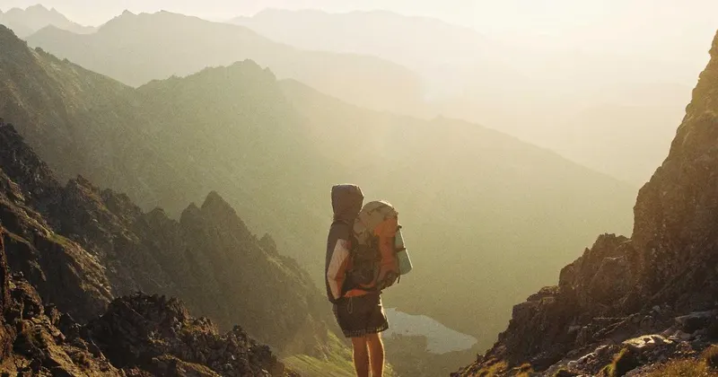 Person cleaning a washing machine with natural products