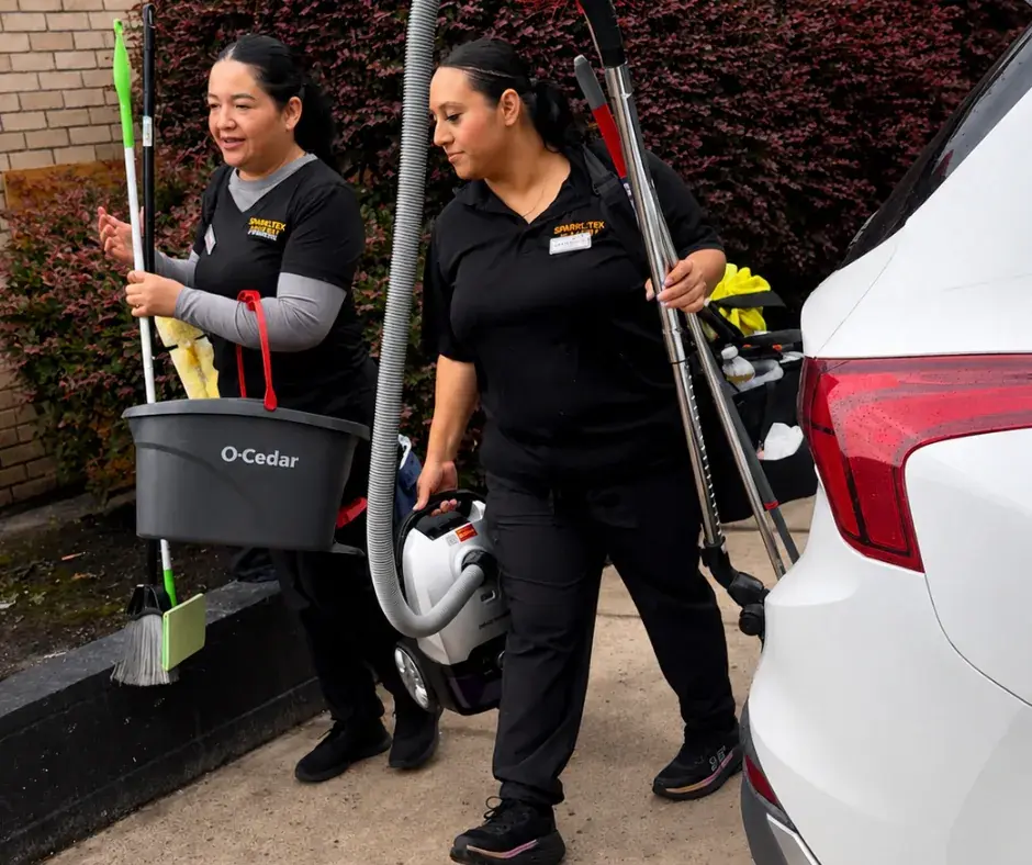 SparkTex Cleaners team members arriving with professional cleaning equipment